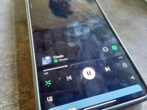 Central Java, Indonesia June 26 2024: smartphone screen display, Spotify apps  Stockfoto's