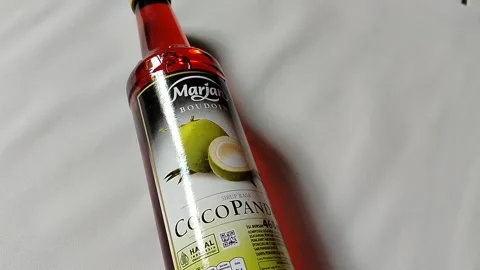 Central Java, Indonesia, March 23, 2026: Marjan Boudoin cocopandan syrup bottle Stock Footage 332159504