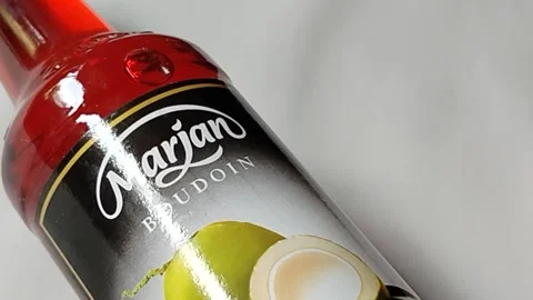 Central Java, Indonesia, March 23, 2026: Marjan Boudoin cocopandan syrup bottle Stock Footage 332159510
