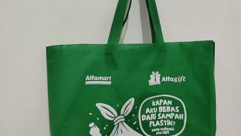 Central Java, Indonesia, March 28, 2026: Green campaign by Alfamart featuring  Video stock 332625830