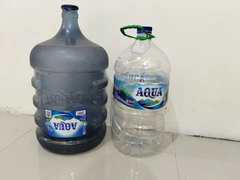 Central Java Indonesia March 28, 2026: Empty water gallon bottles from Aqua,  Photos