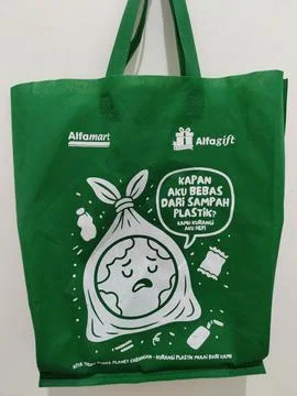 Central Java, Indonesia, March 28, 2026: Green campaign by Alfamart featuring  Stock-Fotos
