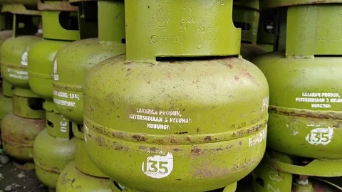 Central Java Indonesia March 5, 2026: Green 3 kg LPG gas cylinder commonly used  Stock Footage 330771390