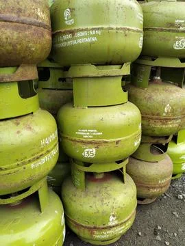 Central Java Indonesia March 5, 2026: Green 3 kg LPG gas cylinder commonly used Stock Photos