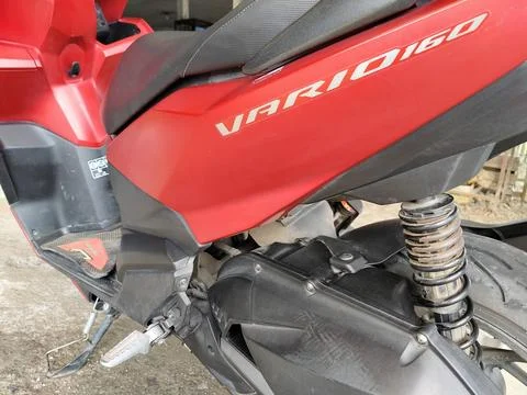 Central Java, Indonesia, March 8, 2026: Red Honda Vario 160 parked outdoors, sho Stock-Fotos
