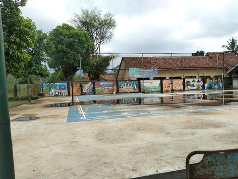 CENTRAL JAVA INDONESIA - MAY 16, 2026: An empty outdoor school sports court feat Stock Photos