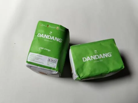 Central Java, Indonesia, May 19, 2026: Unopened green paper packaging of Dandang Stock-Fotos