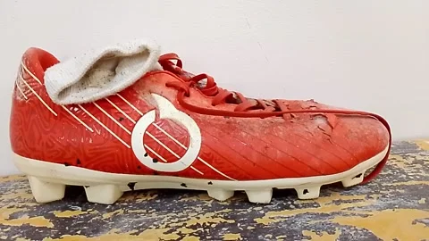 Central Java Indonesia November 25, 2025: Side view of a soccer shoe. Stock Footage 323206588