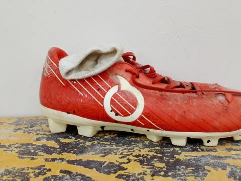 Central Java Indonesia November 25, 2025: Side view of a soccer shoe. Fotos de archivo