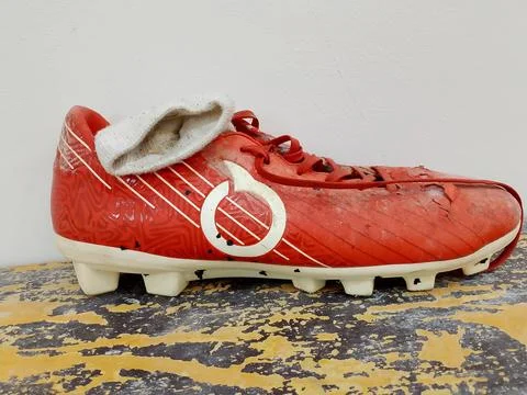 Central Java Indonesia November 25, 2025: Side view of a soccer shoe. Fotos de archivo