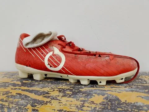 Central Java Indonesia November 25, 2025: Side view of a soccer shoe. Фото