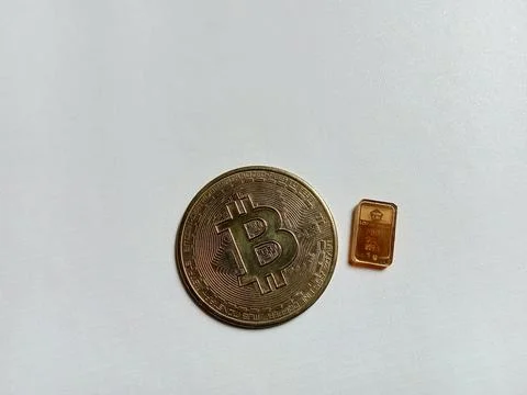 Central Java Indonesia November 5 2024: illustration of bitcoin and gold bullion Stock Photos