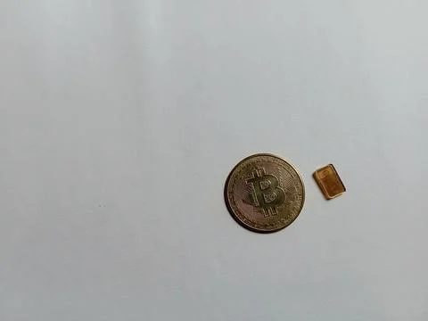 Central Java Indonesia November 5 2024: illustration of bitcoin and gold bullion Stock Photos