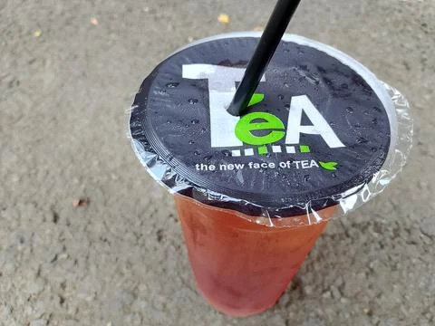 Central Java Indonesia October 16, 2025: sweet iced tea in a plastic cup. Фото