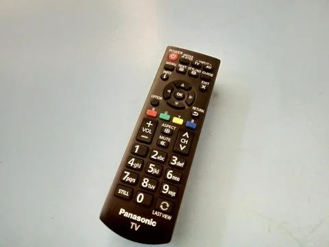 Central Java Indonesia October 2 2024: tv remote, over flat background.  Stock Photos