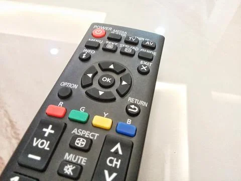 Central Java Indonesia October 2 2024: tv remote, over flat background.  Фото