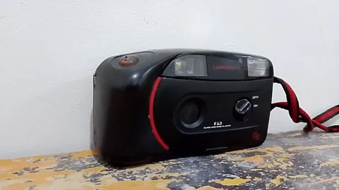 Central Java Indonesia October 21, 2025: cannonmate SM111 analog camera. Stock Footage 320678483