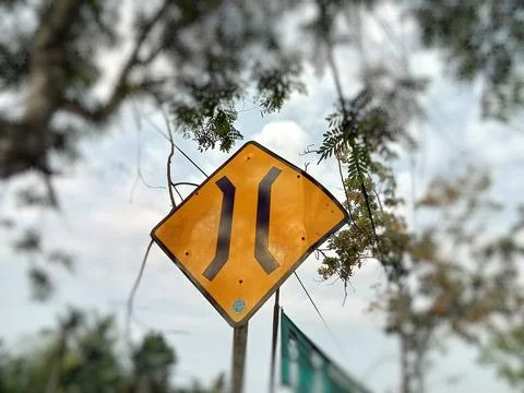 Central Java Indonesia October 29 2023: Traffic signs, bridge narrowing  Stock Photos