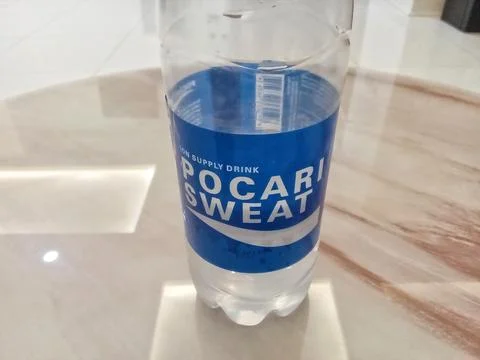 Central Java Indonesia October 3 2024: Pocari Sweat bottle, on the table. Stock-Fotos
