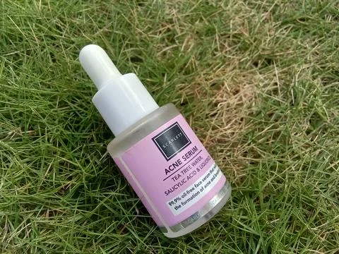 Central Java Indonesia October 31 2023: Scarlett Acne Serum, on green grass  Photos