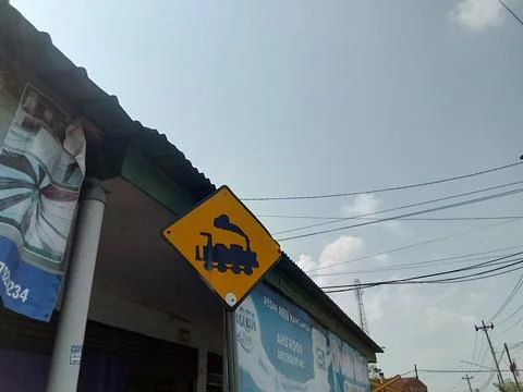 Central Java Indonesia October 7, 2025: traffic sign there is a railway track. Stock Photos