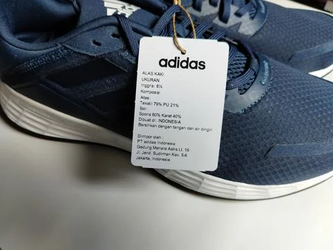 Central Java, Indonesia, September 11 2026: Brand new navy blue Adidas sneakers Stock Photos