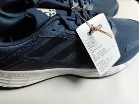 Central Java, Indonesia, September 11 2026: Brand new navy blue Adidas sneakers Stock Photos