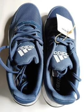 Central Java, Indonesia, September 11 2026: Brand new navy blue Adidas sneakers Stock Photos