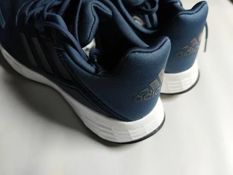 Central Java, Indonesia, September 11 2026: Brand new navy blue Adidas sneakers Stock Photos