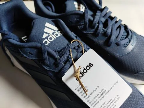 Central Java, Indonesia, September 11 2026: Brand new navy blue Adidas sneakers Stock Photos