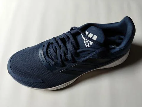 Central Java, Indonesia, September 11 2026: Brand new navy blue Adidas sneakers Stock Photos