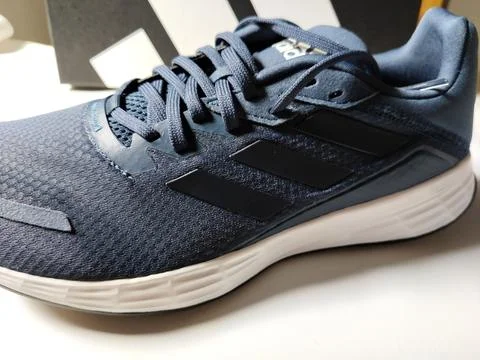 Central Java, Indonesia, September 11 2026: Brand new navy blue Adidas sneakers Stock Photos