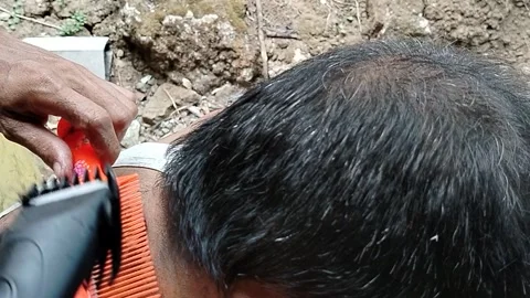 Central Java Indonesia September 12 2026: An Indonesian local man receives a cas Stock-Footage 345431883