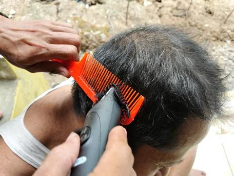 Central Java Indonesia September 12 2026: An Indonesian local man receives a cas Stock Photos