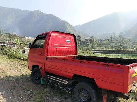 Central Java Indonesia September 18 2026: Red commercial pickup truck parked  Fotos de archivo