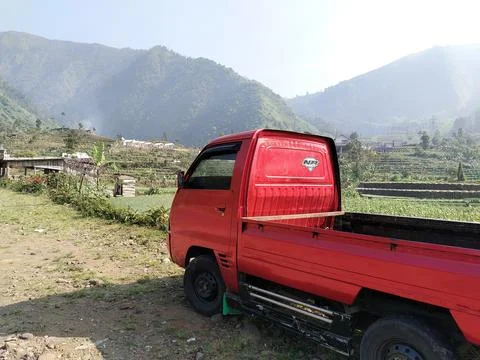 Central Java Indonesia September 18 2026: Red commercial pickup truck parked  Stock-Fotos