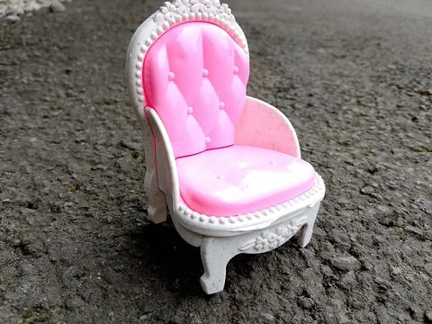 Central Java Indonesia September 30, 2025: white chair toy with dominant pink co Foto stock