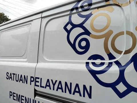 Central Java Indonesia September 7 2026: Close-up of a white operational van Stock Photos