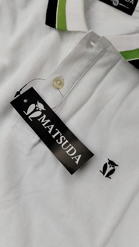 Central Java Indonesia15 July 2026: white polo shirt with a classic collar isola Vídeo Stock 340120194