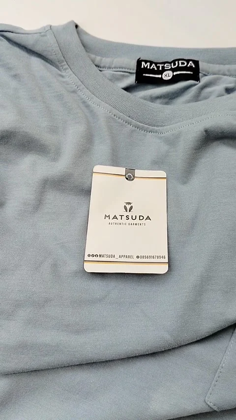 Central Java Indonesia15 July 2026: Light blue crew neck t-shirt with chest Stock Footage 340120198