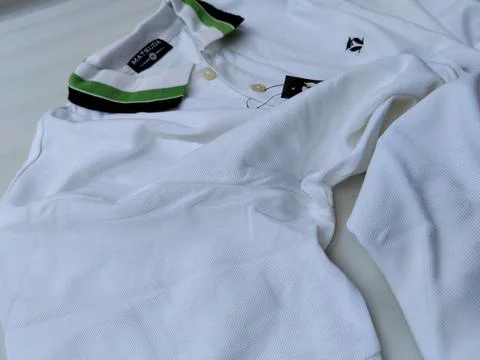 Central Java Indonesia15 July 2026: white polo shirt with a classic collar isola Stock-Fotos