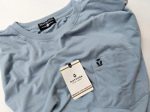 Central Java Indonesia15 July 2026: Light blue crew neck t-shirt with chest pock Stock-Fotos