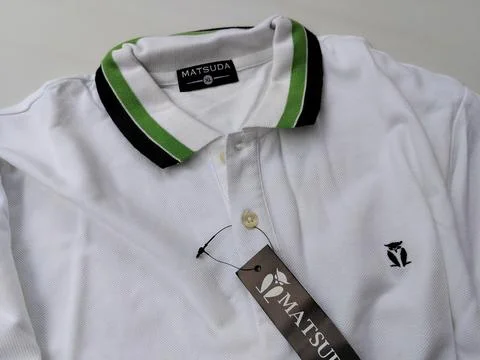 Central Java Indonesia15 July 2026: white polo shirt with a classic collar isola Stock-Fotos