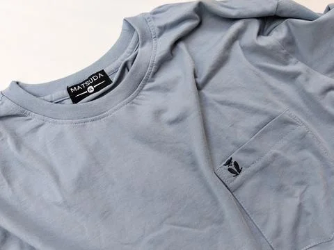 Central Java Indonesia15 July 2026: Light blue crew neck t-shirt with chest  Stock-Fotos