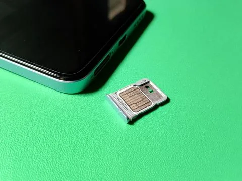 Central Java January 30, 2026: Hybrid slot sim card, smartphone. Фото