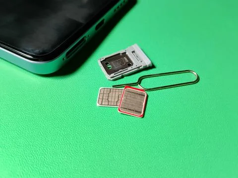 Central Java January 30, 2026: Hybrid slot sim card, sim ejector , smartphone. Фото