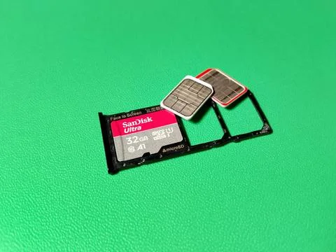 Central Java January 30, 2026: sim card slot, memory card, smartphone. Stock-Fotos