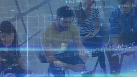 Central man typing on laptop and pointing, peers writing, data overlays Stock Footage 333062707
