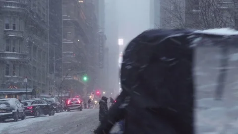 Central Park Bicycle Cabs Pedicabs Ride Toward Times Square in Snow Stock Footage 71266313