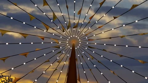 Central pole and radial strings holding lights and pennant flags, breeze causing Video stock 340674589